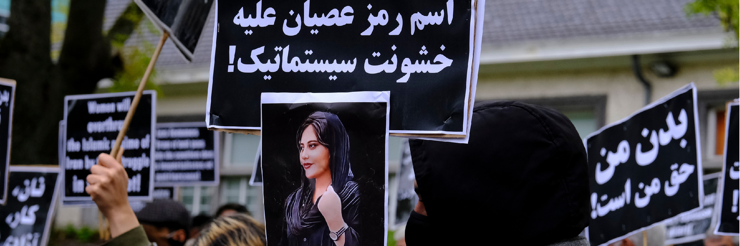 Protestors take part during a demonstration in front of the Iranian embassy in Brussels, Belgium, following the death of Mahsa Amini